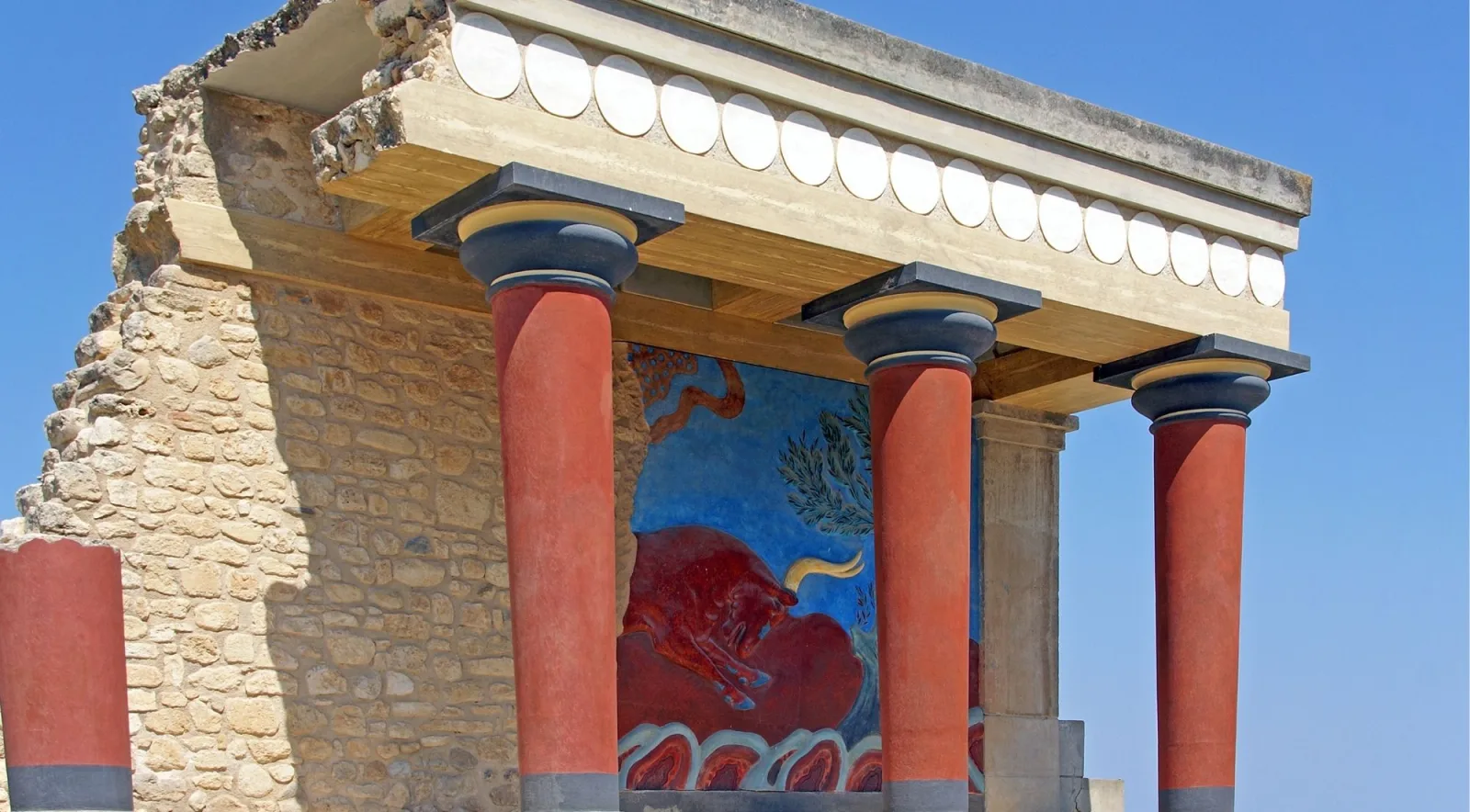 Close view of the north entrance portico at Knossos and its relief fresco of a charging bull