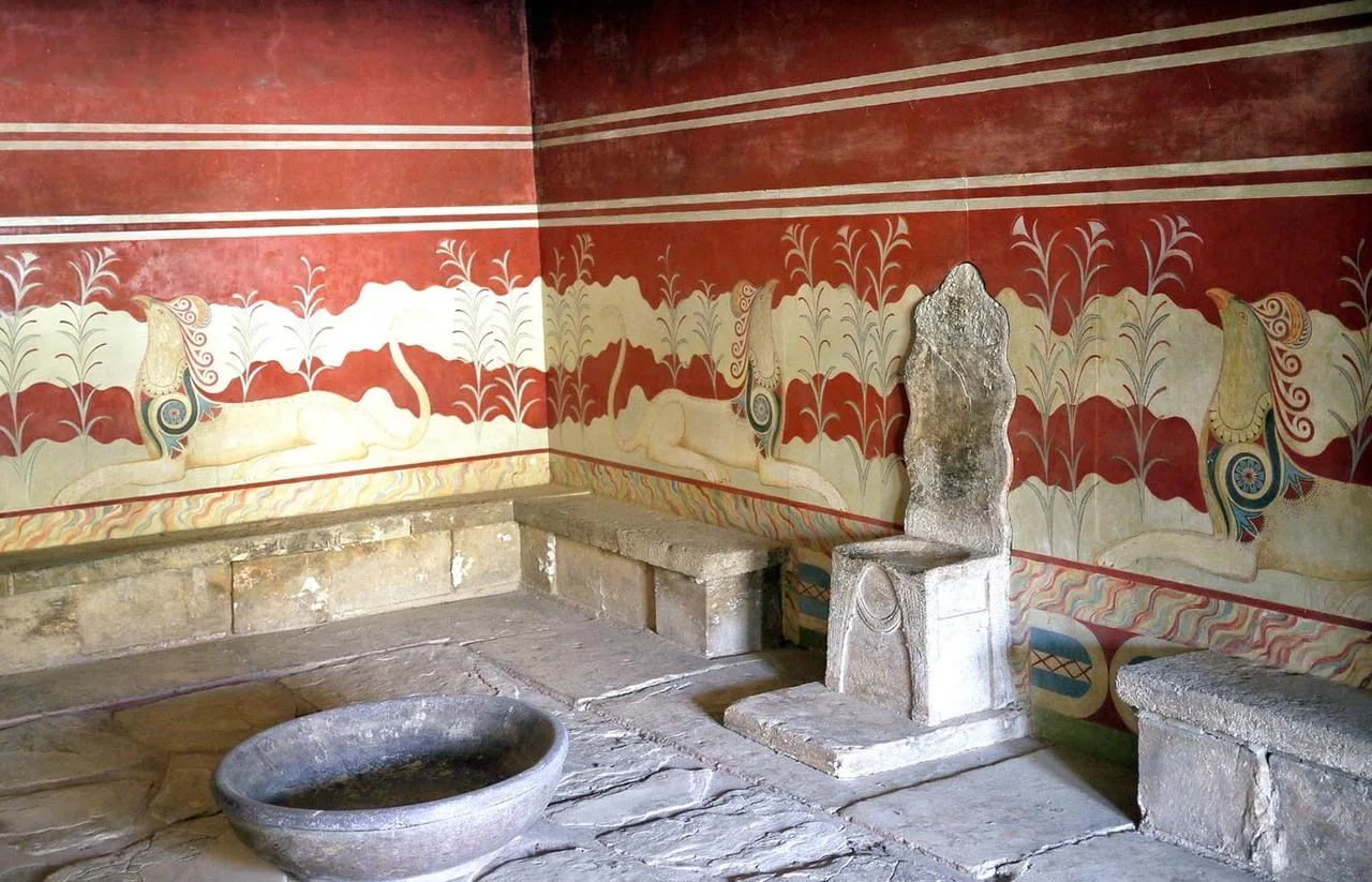 The Throne Room at Knossos with its stone throne, benches and griffin fresco